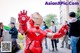 A man dressed as Iron Man in a crowd of people.